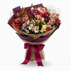 Букет от 19 разноцветни алстромерии в луксозна опаковка с тъмнолилава панделка