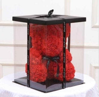 Червено мече от изкуствени розички с панделка в луксозна кутия